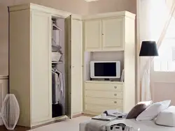 Corner Wardrobe In The Bedroom With TV Photo