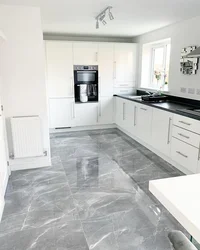 Gray marble on the kitchen floor photo
