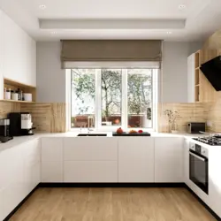 White kitchen with sink by the window photo