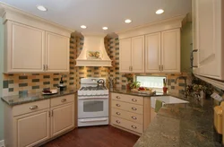 Photo of a kitchen with hob and hood