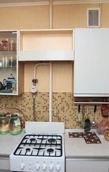 Photo of a gas pipe and hood in the kitchen