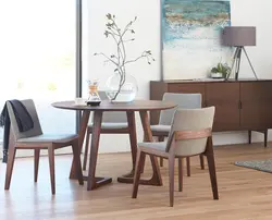 Chairs in the living room photo with a round table