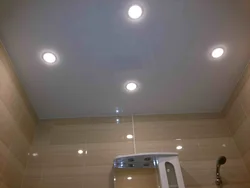 Ceiling in a small bath and toilet photo