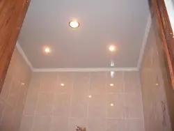 Ceiling in a small bath and toilet photo