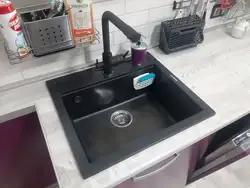 Black Sink And Faucet In The Kitchen Photo