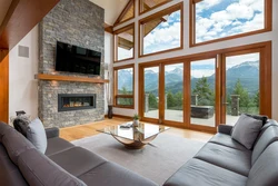 Living Room With Fireplace And Panoramic Windows Photo