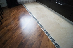 Seams on kitchen floor tiles photo