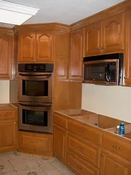 Photo Of An Oven Built Into A Corner Kitchen