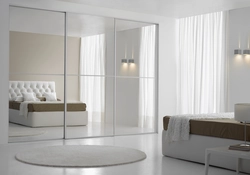 Sliding wardrobes with one mirror in the bedroom photo