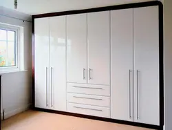 Built-In Wardrobes With Hinged Doors In The Hallway Photo
