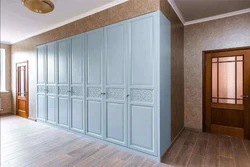 Built-in wardrobes with hinged doors in the hallway photo