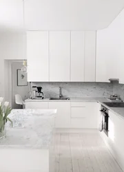 Kitchen design with white marble countertop photo