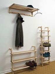 Shoe shelves and hangers in the hallway photo