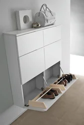 Shoe rack with mirror in the hallway photo