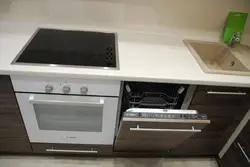 Kitchen with dishwasher and oven photo