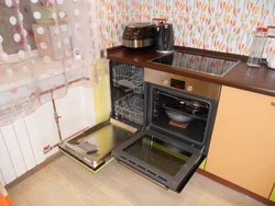 Kitchen With Dishwasher And Oven Photo