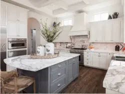White kitchen with gray marble countertop photo