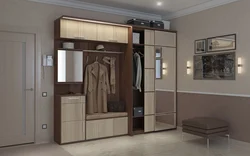 Hallway with ottoman and mirror and wardrobe photo