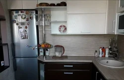 Photo small corner kitchens with a refrigerator by the window