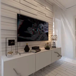 Qonaq otağının interyerindəki 3D panellər televizorla fotoşəkil
