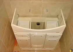 How to install a sink with a cabinet in the bathroom photo