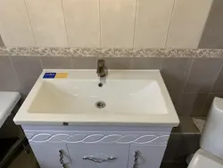 How to install a sink with a cabinet in the bathroom photo