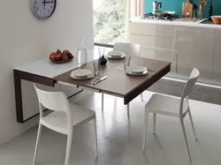 Dining table for a small kitchen against the wall photo