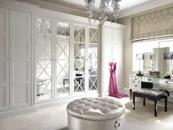 Wardrobe in the hallway with mirrors to the ceiling photo
