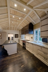 Ceiling design in the kitchen in a wooden house photo
