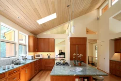 Ceiling Design In The Kitchen In A Wooden House Photo