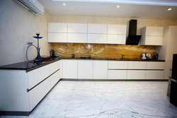 Photo of a kitchen with marbled porcelain stoneware floors