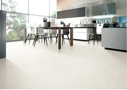 Photo of a kitchen with marbled porcelain stoneware floors