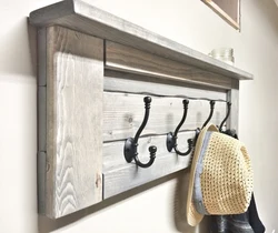 Coat rack with shelf in the hallway made of wood photo