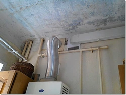 Suspended ceiling in the kitchen with a gas pipe photo