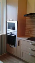 Kitchen oven and microwave in one cabinet photo
