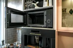 Kitchen oven and microwave in one cabinet photo