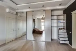 Wardrobe to the ceiling in the bedroom with suspended ceilings photo