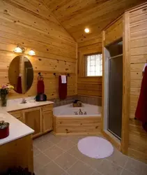 Bathroom in a country house in a wooden house photo with shower