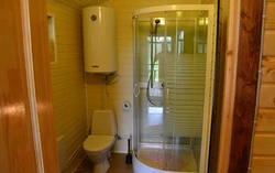 Bathroom in a country house in a wooden house photo with shower