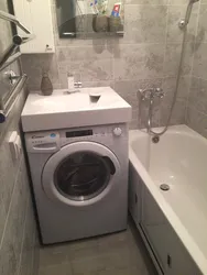 Toilet with washing machine and sink without bathtub design photo