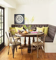 Dark sofa in the kitchen interior