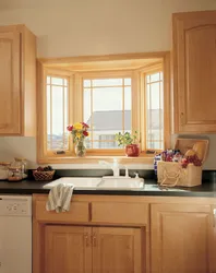 Wooden windows in the kitchen interior
