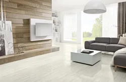 Light porcelain tiles in the living room interior