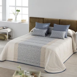 White bedspread in the bedroom interior