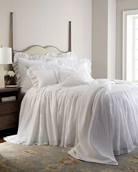 White bedspread in the bedroom interior