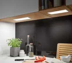 Surface-mounted lamp in the kitchen interior