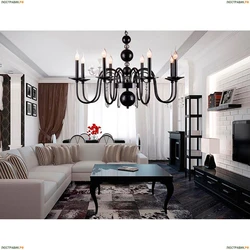 White chandelier in the living room interior