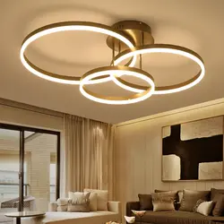 Круглые светильники в интерьере гостиной
