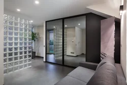 Glass partition in the bedroom interior