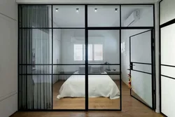 Glass partition in the bedroom interior